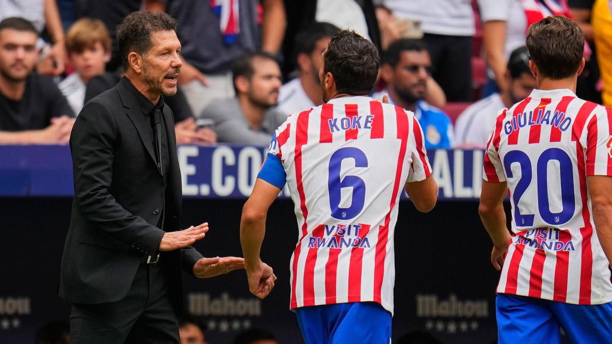 Koke and Simeone in discussion