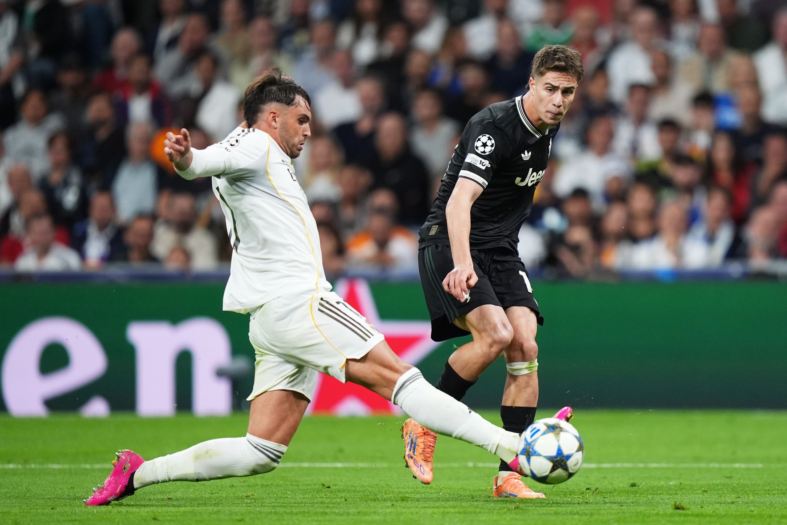 Raul Asencio makes a tackle against Juventus.