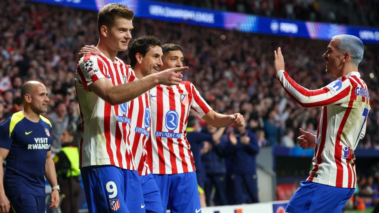 Sorloth celebrates his hat-trick with Griezmann.